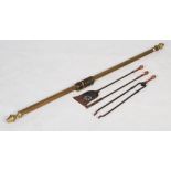 Late 19th/ early 20th century copper handled set of fire irons, together with a brass fluted curtain