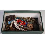 Large box of assorted costume jewellery.