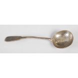 A late 19th century Russian silver sifting spoon, fiddle pattern with engraved initials 'G.B', the