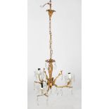Gilt metal and crystal chandelier, with three scrolling arms supporting crystal drip pans and