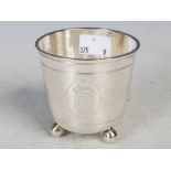 Antique Continental white metal beaker cup, with engraved oval panels of armorial crests raised on