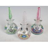 Three Perthshire Paperweights scent bottles and stoppers, each decorated with colourful millefiori