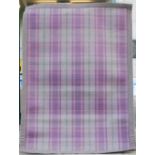 ANTA SCOTLAND, a purple and green tartan rug, 234cm x 171cm.