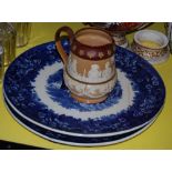 Doulton Lambeth glazed stoneware jug depicting a medieval banquet scene, stamped with factory mark