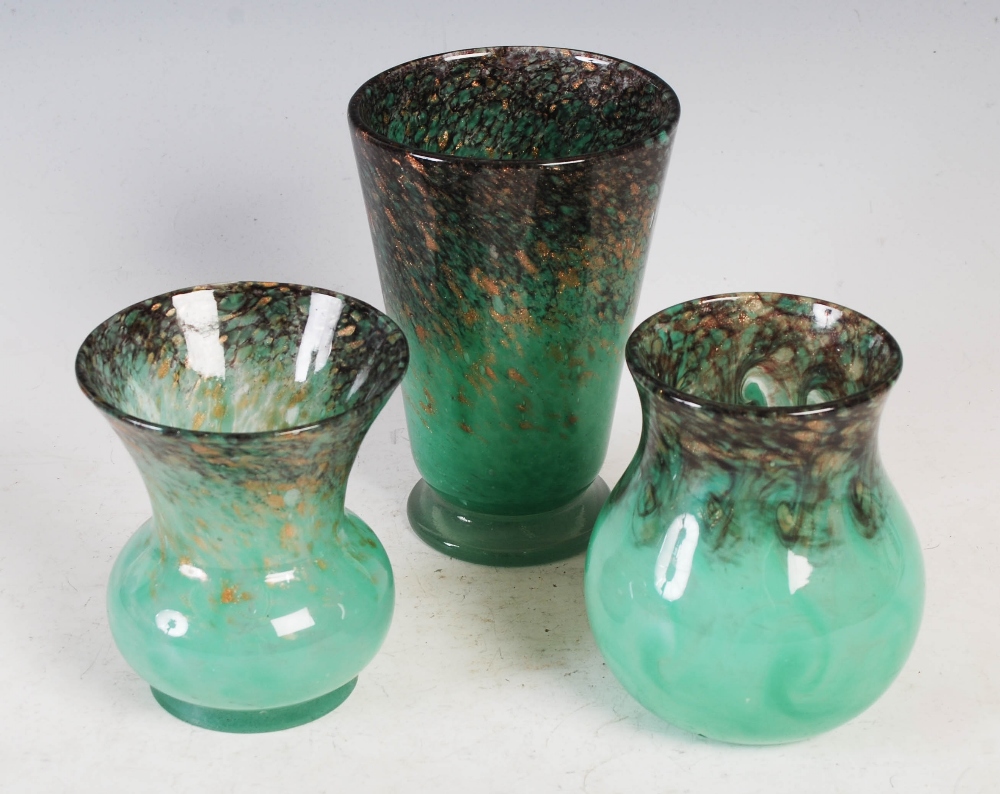 Three Monart vases, comprising; a shape DD vase 16cm high, a shape SA vase, 12.5cm high, and a