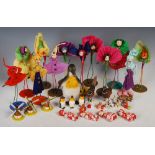 Collection of mid-20th century children's toys, including handmade paper models of flower fairies,