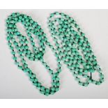 Pair of early 20th century simulated spinach jade long bead necklaces.