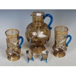 Group of Victorian painted glass items, including a water jug, two single handled drinking glasses
