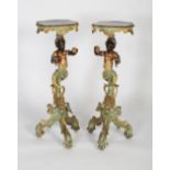 A pair of late 19th century Italian Venetian giltwood and polychrome decorated blackamoor torcheres,