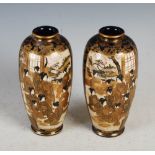 A pair of Japanese Satsuma pottery blue ground vases, Meiji Period, decorated with Bijan and Lohan