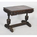 A late 19th / early 20th century Jacobean Revival carved oak table, the rectangular top with