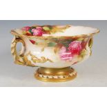 Royal Worcester twin-handled footed bowl dated 1910 decorated by H. Austin, painted with roses and