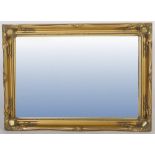 Modern gilt framed mirror, the frame with moulded corners with a bevelled glass plate, 91cm high.