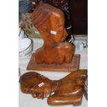 Two South East Asian carved teak figures of stylised African women, similar to the manner of