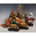 Group of modern decorative figures, including some carved South East Asian child figures, an