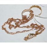 A 9ct gold necklace and two 9ct gold rings, gross weight 12.4 grams.