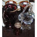 A late 19th century Bohemian cut ruby glass vase, depicting stags and birds, together with a pair of