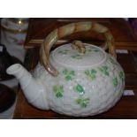 Late 19th/ early 20th century Irish Belleek porcelain tea pot, the body in woven wicker style design