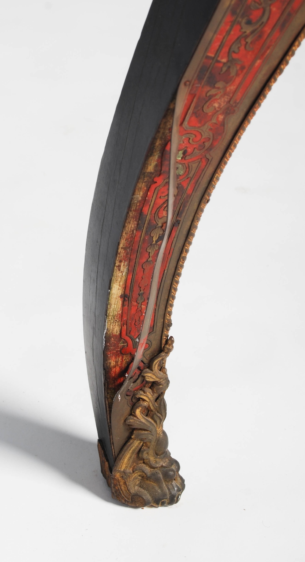 A 19th century ebonised and gilt metal mounted boulle centre table. The shaped oval top with gilt - Image 8 of 9