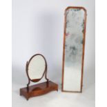 Early 20th century mahogany table mirror, the mirror of oval form with long slender supports above a