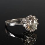 A white metal diamond solitaire ring, set with an old cut diamond calculated to weigh 3.64ct, ring