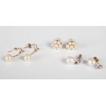 Three pairs of assorted yellow and white metal mounted pearl earrings, comprising; a pair of