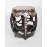 A Chinese marble topped mother-of-pearl inlaid carved darkwood barrel stool, Qing Dynasty, the