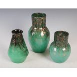 Three Monart vases, comprising, a tall shape GI vase, 22cm high, a smaller shape GI vase, 16cm