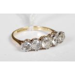 Yellow and white metal five stone CZ ring, stamped '18ct & plat'.