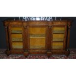 A Victorian walnut, marquetry and gilt metal mounted credenza, the rectangular top with canted front