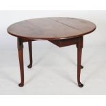 An 18th century mahogany drop-leaf table, the top of oval form with two leaves on four tapered