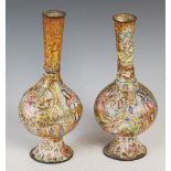 Pair of Indo-Persian enamel bottle vases, decorated with circular and oval shaped panels enclosing