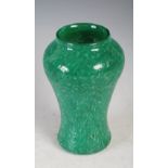An early Monart vase, shape C, surface decorated in green and opaque white with typical whorls,
