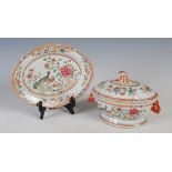 A 19th century Chinese export porcelain sauce tureen, cover and plate, the tureen and plate of
