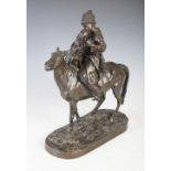 Late 19th / early 20th century Russian bronze figure group of Cossack soldier on horseback bidding