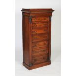 A Victorian mahogany Wellington chest, the square caddy top hinged to reveal a top cabinet, with