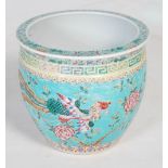 Chinese 20th century turquoise famille rose jardiniere, the body with scenes of peonies and
