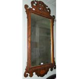 Three carved mahogany mirrors in the Georgian taste, early 20th century with pierced frame, one with