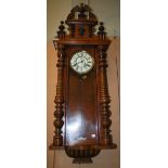 Early 20th century wall mounted walnut Vienna regulator clock by Gustav Becker, the case with two