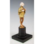 Ferdinand Preiss (1882 - 1943), a cold painted bronze and ivory figure of a boy, modelled standing