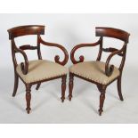 Pair of 19th century carver mahogany dining chairs, with straight wide back rails and a carved
