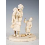 Japanese ivory okimono of mother and boy, Meiji Period, signed on red lacquer rectangular seal, 12.
