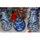 Pair of modern Chinese blue and white double-gourd vases, with decorations of dragons together