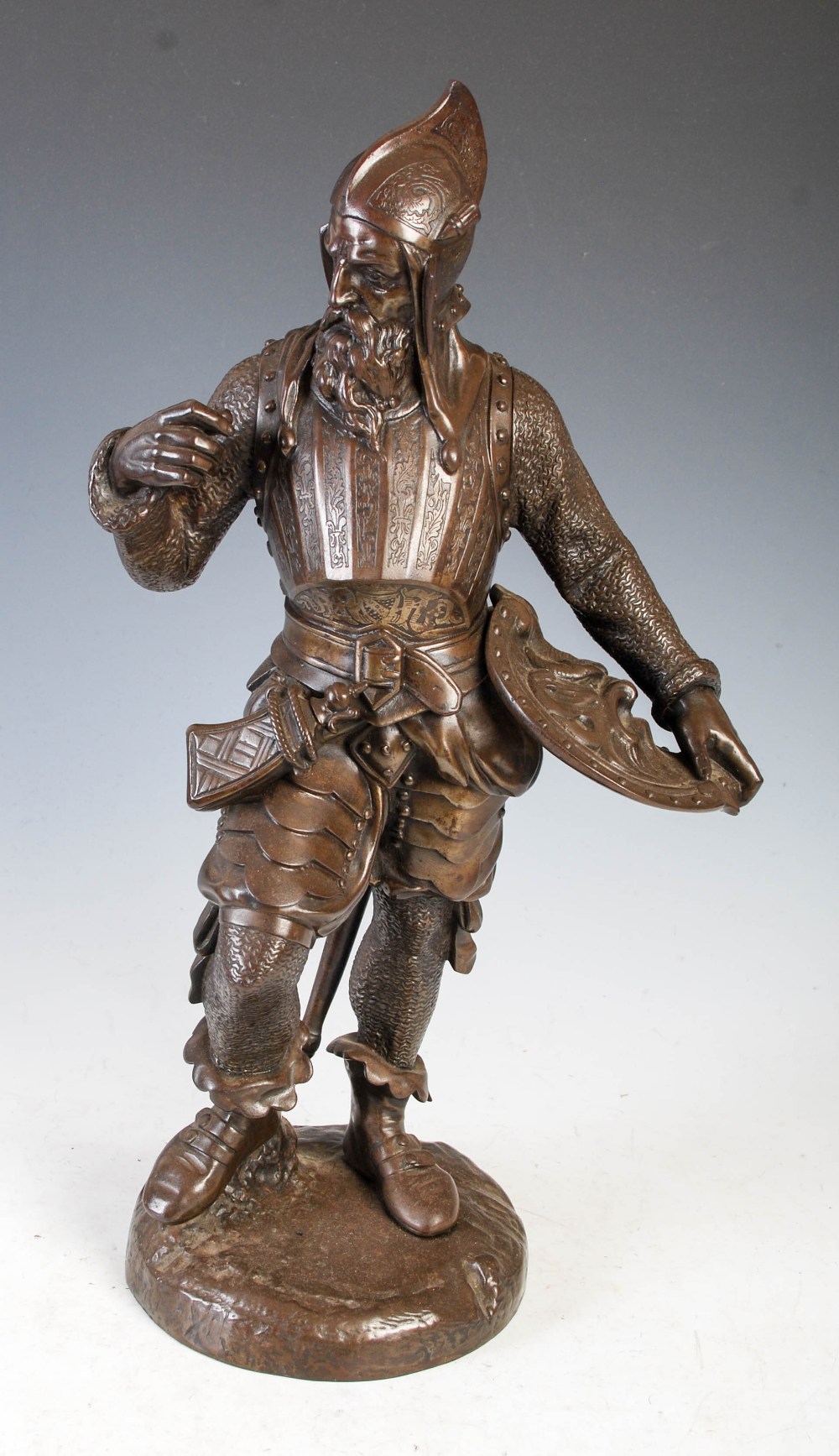 Late 19th/ early 20th century bronzed figure of a knight, 50cm high.