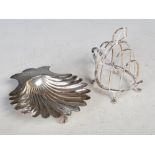 Sheffield silver shell-shaped dish, together with a Sheffield silver five bar toast rack, both