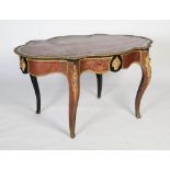 A 19th century ebonised and gilt metal mounted boulle centre table. The shaped oval top with gilt