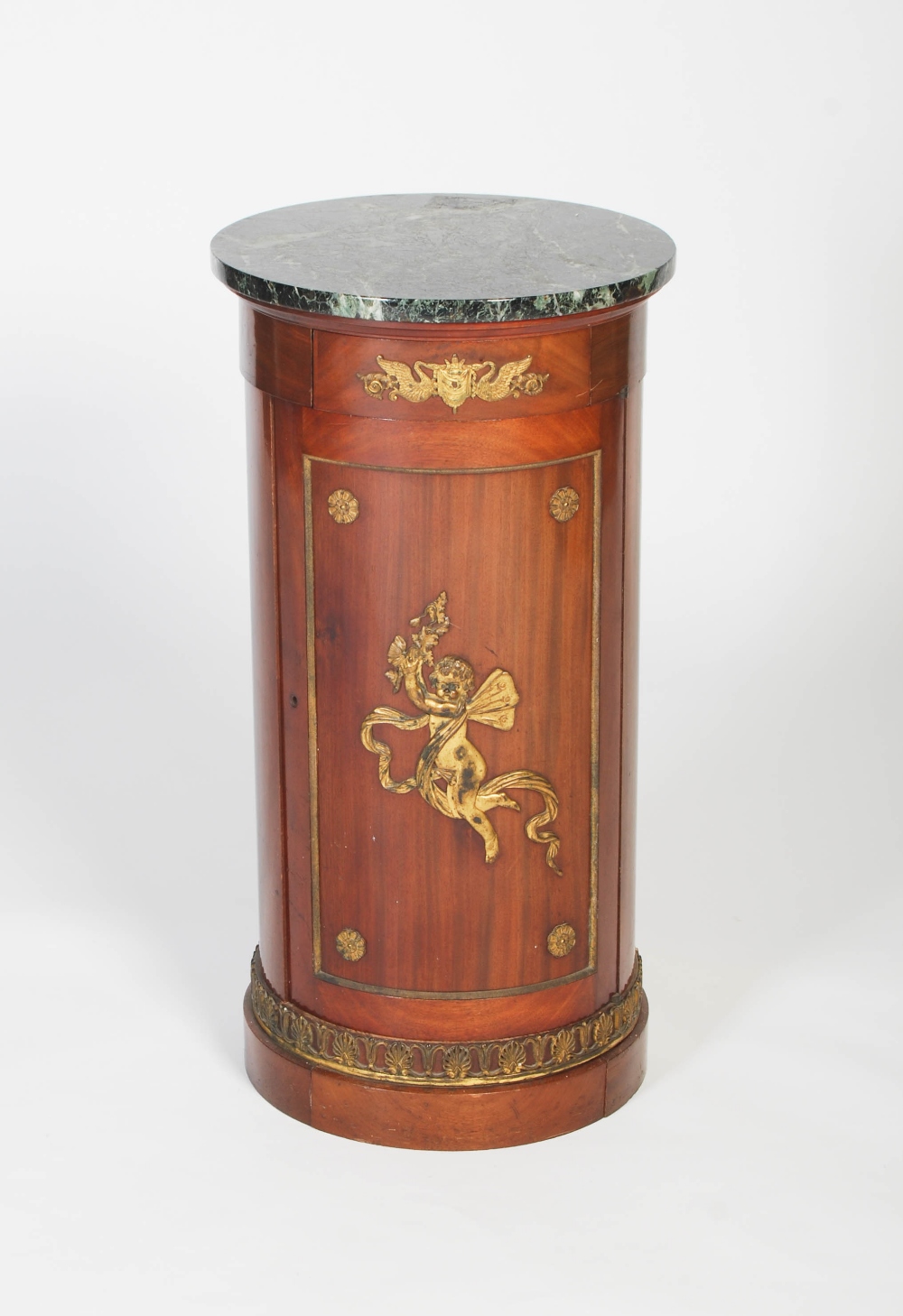 A French Empire style gilt metal mounted mahogany pedestal / pot cupboard, early 20th century, a