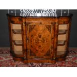 A Victorian walnut, marquetry and gilt metal mounted credenza, the shaped top above a frieze
