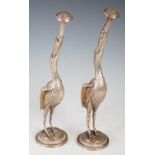 A pair of 19th century Indian silver rosewater sprinklers, modelled as cranes supporting