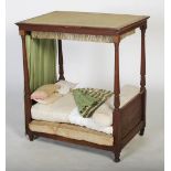 An unusual miniature mahogany four poster apprentice/ doll's bed, probably late 19th century, with a